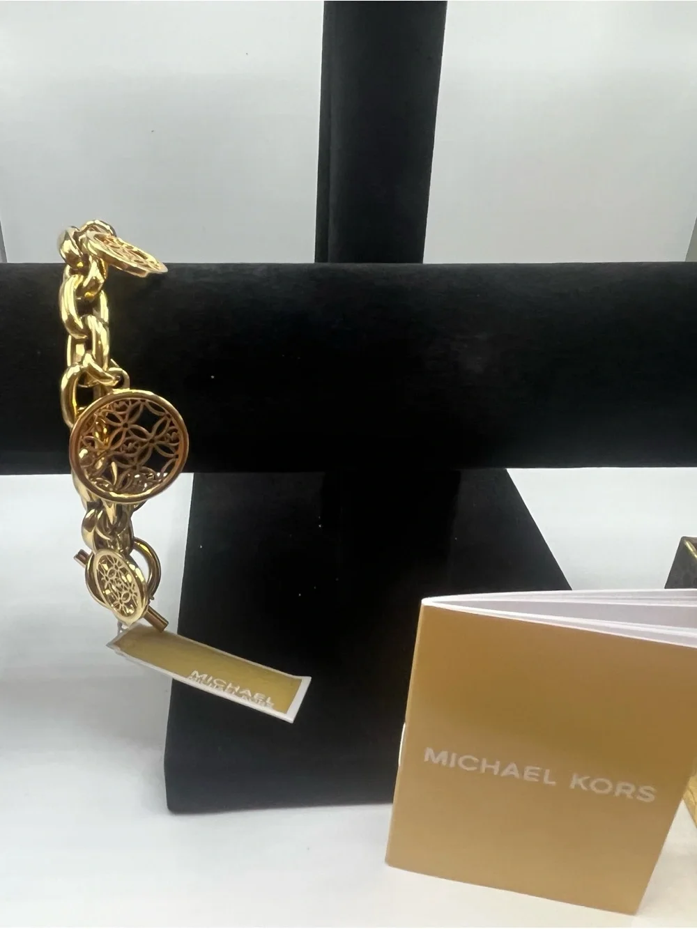 Michael Kors Gold Tone Charm Toggle Bracelet MK Logo Medallion NWT in Box